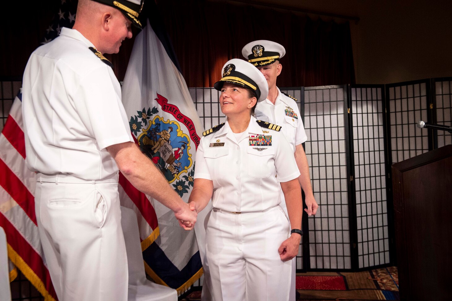 Cmdr. Dawn Allen relieves Cmdr. Andrew Klug as commanding officer of guided missile destroyer USS William P. Lawrence (DDG 110) during a change of command ceremony held on U.S. Fleet Activities Yokosuka. William P. Lawrence is deployed to the U.S 7th Fleet area of operations in support of security and stability in the Indo-Pacific region.