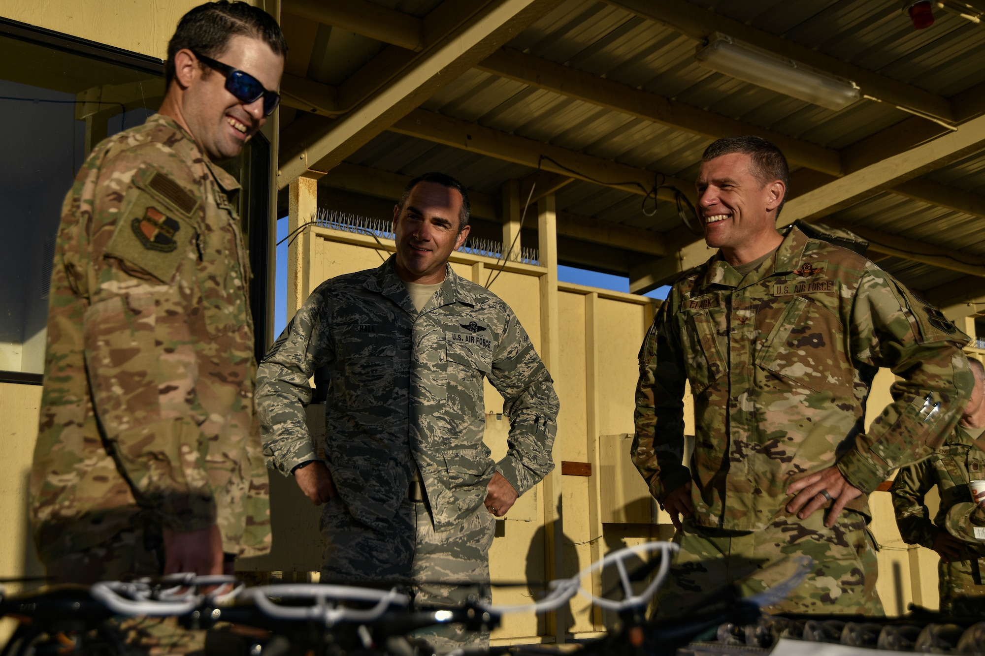 Staff Sgt. Colton Becker, 9th Security Forces Squadron training flight, gives a safety brief to Chief Master Sgt. Dustin Hall, 9th Reconnaissance Wing command chief, and Col. Andrew Clark, 9th RW commander, prior to a demonstration of the Smart Shooter sighting device at Beale Air Force Base, California, Aug. 14, 2019. The sighting device attaches to the weapon and locks on then fires to neutralize its target with or without movement. The device is also being used to limit friendly fire as the weapon cannot be fired unless it is purposely locked on. (U.S. Air Force photo by Tech. Sgt. Alexandre Montes)