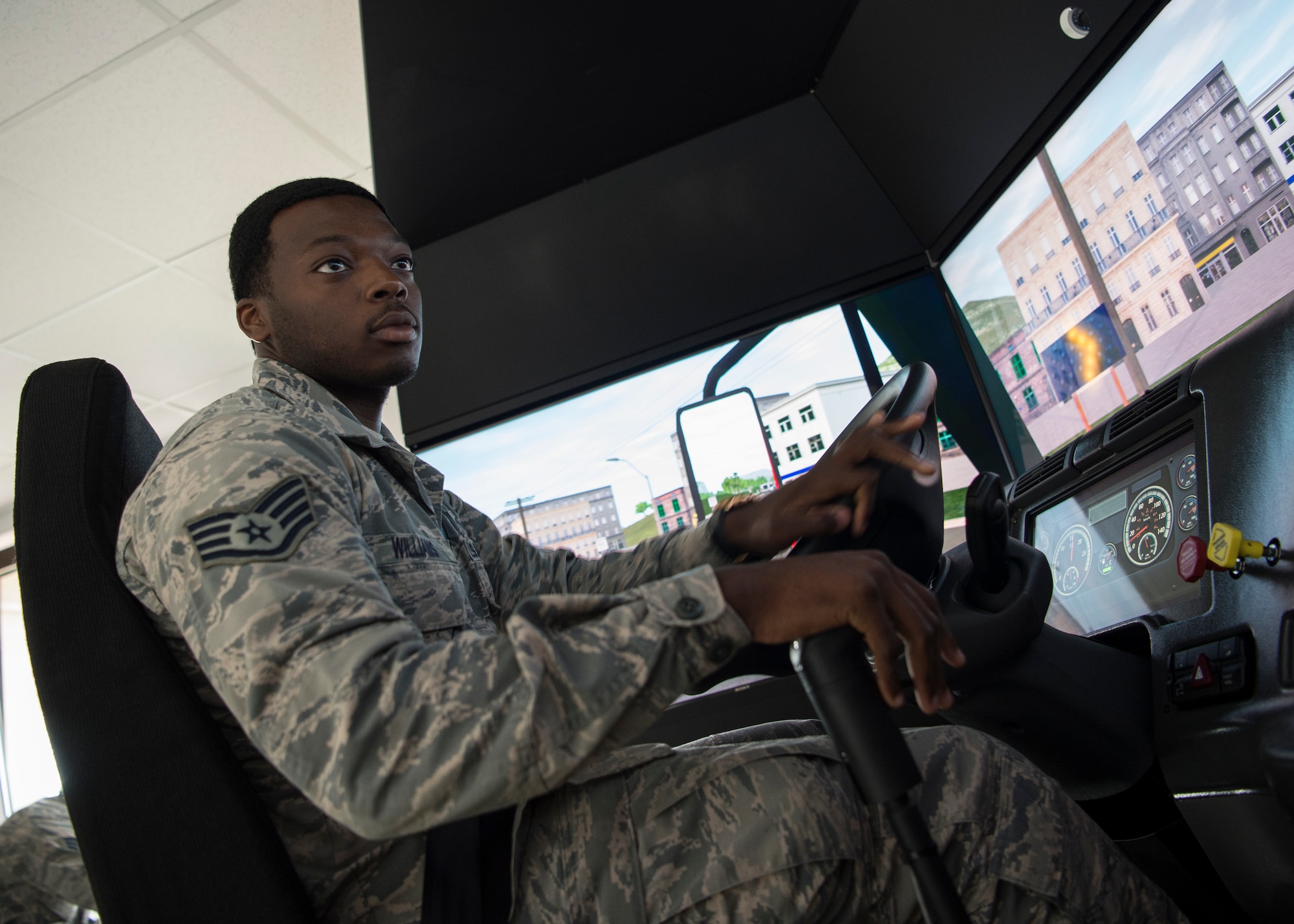 U.S. Air Force Staff Sgt. John Williams, 86th Vehicle Readiness Squadron assistant noncommissioned officer in charge of equipment support, turns on the 86th VRS’s new vehicle simulator at Ramstein Air Base, Germany, Aug 7, 2019.