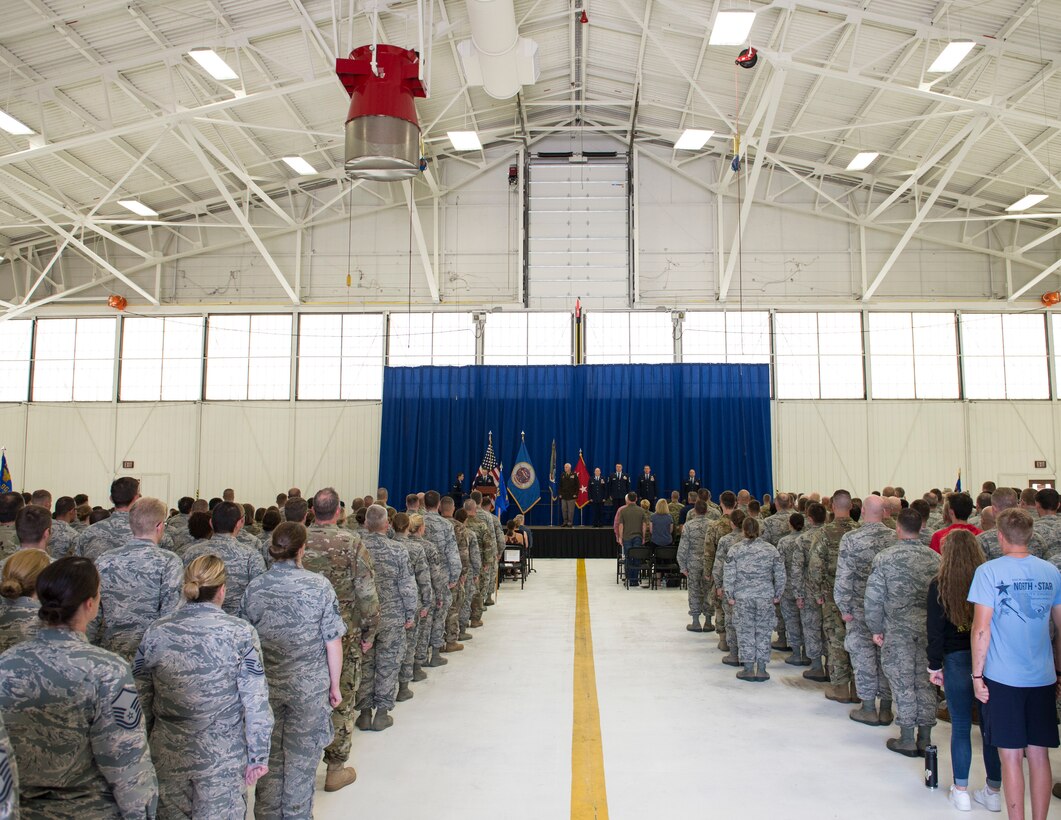 U.S. Air Force Airmen from the 133rd Airlift Wing, along with friends and family of U.S. Air Force Col’s. James Cleet and Daniel Gabrielli gather for a change of command ceremony in St. Paul, Minn., Aug., 16, 2019.
