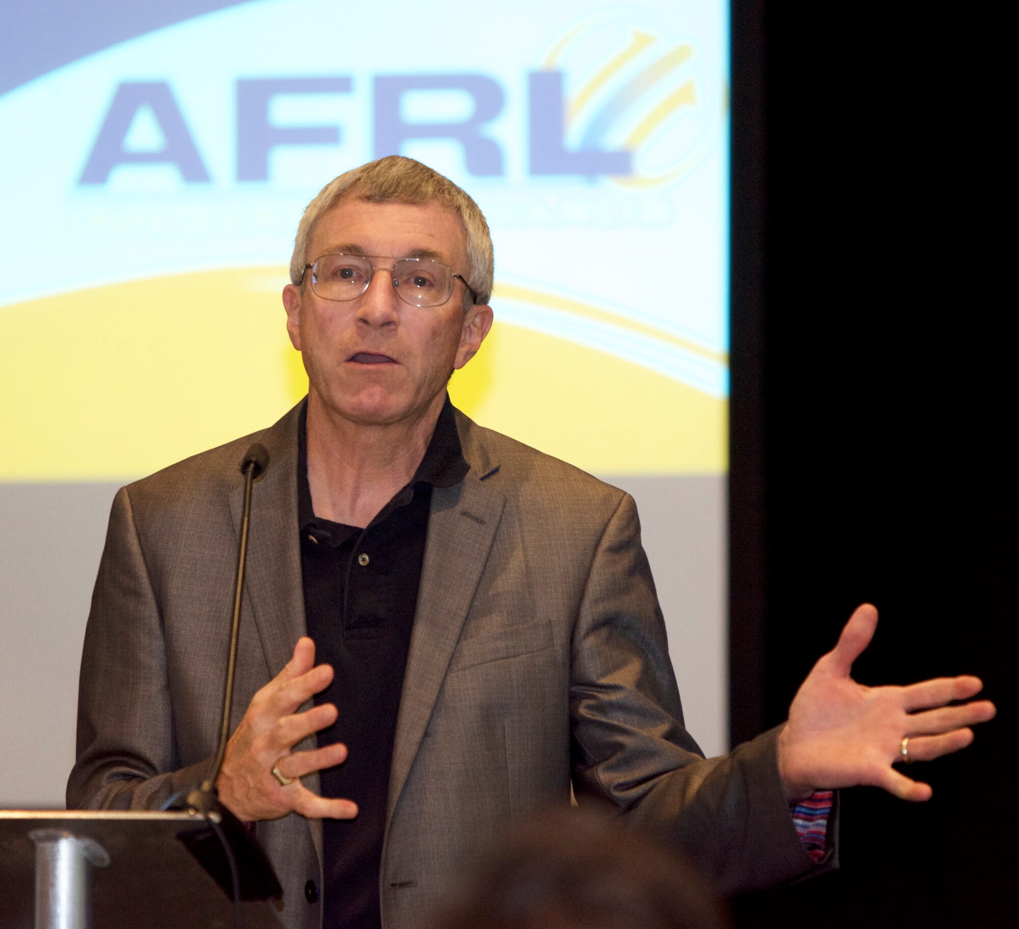 Dr. Neil McCasland director of technology for Applied Technology Associates (ATA) speaks to the Air Force Research Laboratory inventors and their families at AFRL New Mexico’s Innovation Awards celebration held on Aug 9. in Albuquerque, N.M.