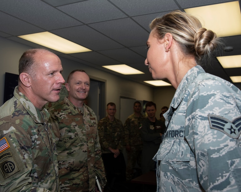 General Lyons and CMSgt France greet Airmen from Pope and Charleston during their visit to Ft Bragg.