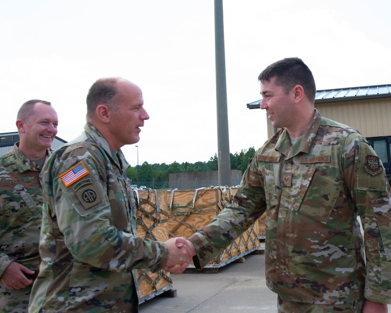General Lyons and CMSgt France greet Airmen from Pope and Charleston during their visit to Ft Bragg.