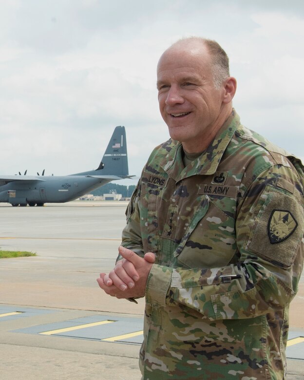 General Lyons and CMSgt France speak with Pope and Charleston airmen during their visit to Pope AAF.