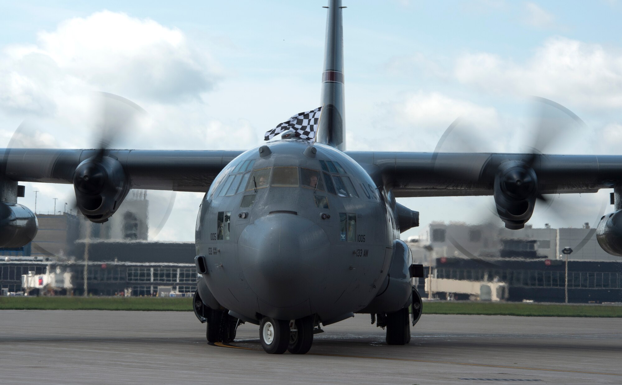 U.S. Air Force Col. Daniel Gabrielli, 133rd Airlift Wing commander, taxies a C-130 Hercules during his fini-flight in St. Paul, Minn., Aug. 16, 2019.