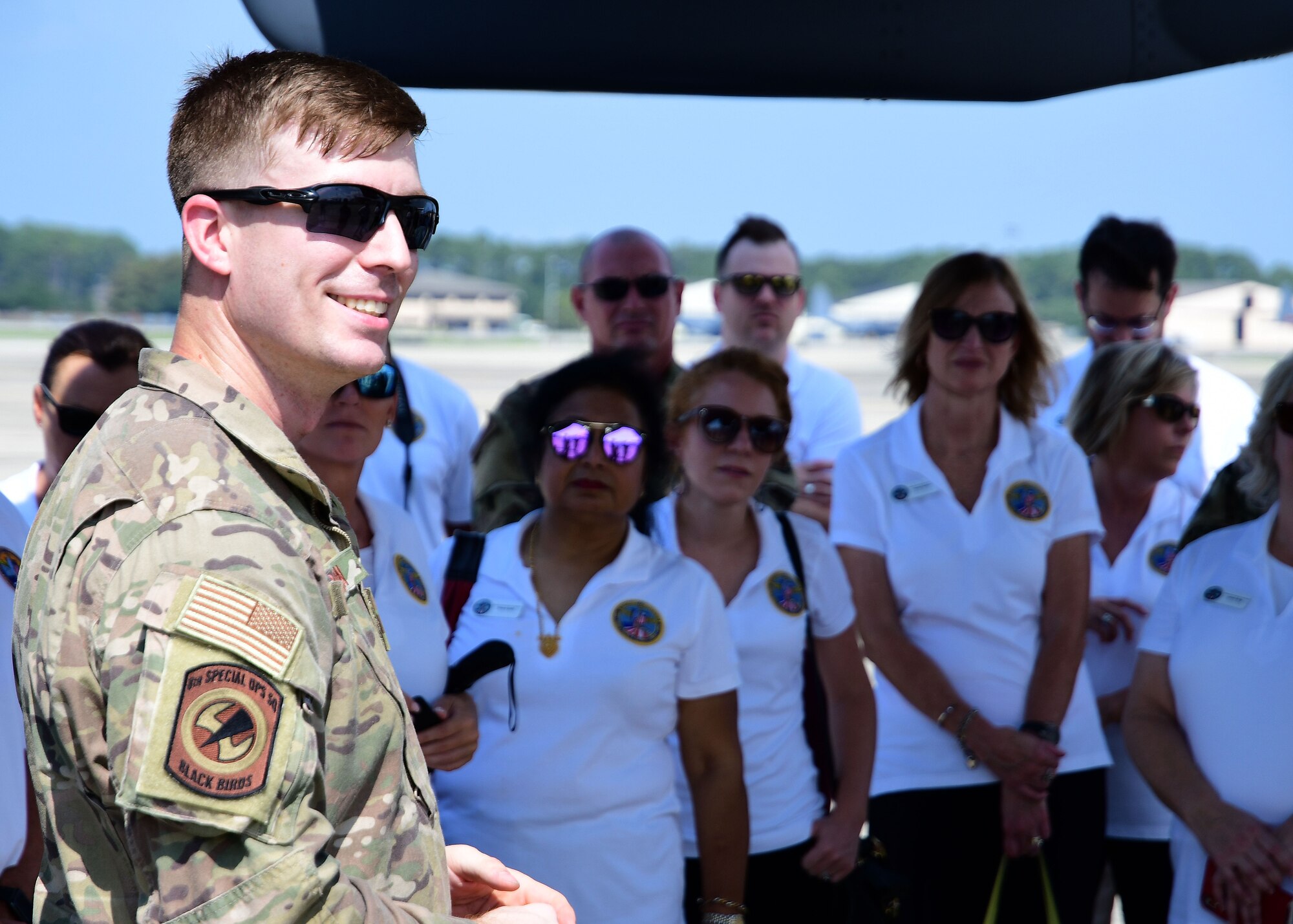 A flight engineer from Hurlburt Field, Florida talks about the CV-22 Osprey to a group of civic leaders from metro Atlanta Aug. 14, 2019.