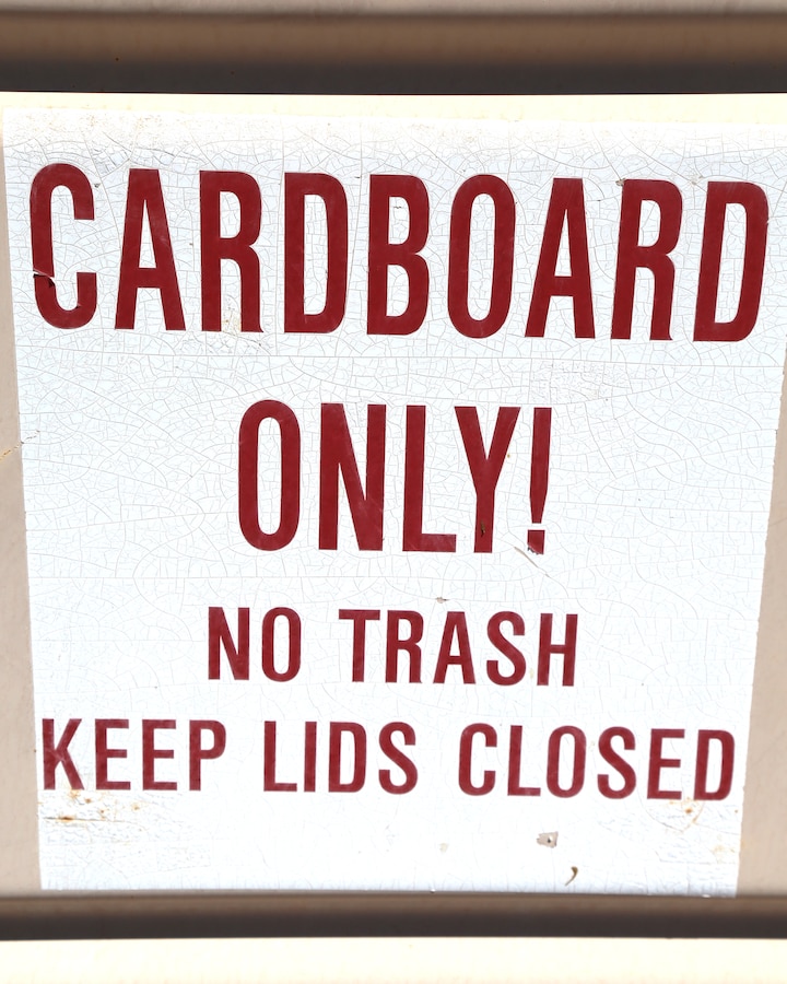 Label for cardboard only is posted on every dumpster aboard Marine Corps Logistics Base Barstow, Calif., Aug. 20.