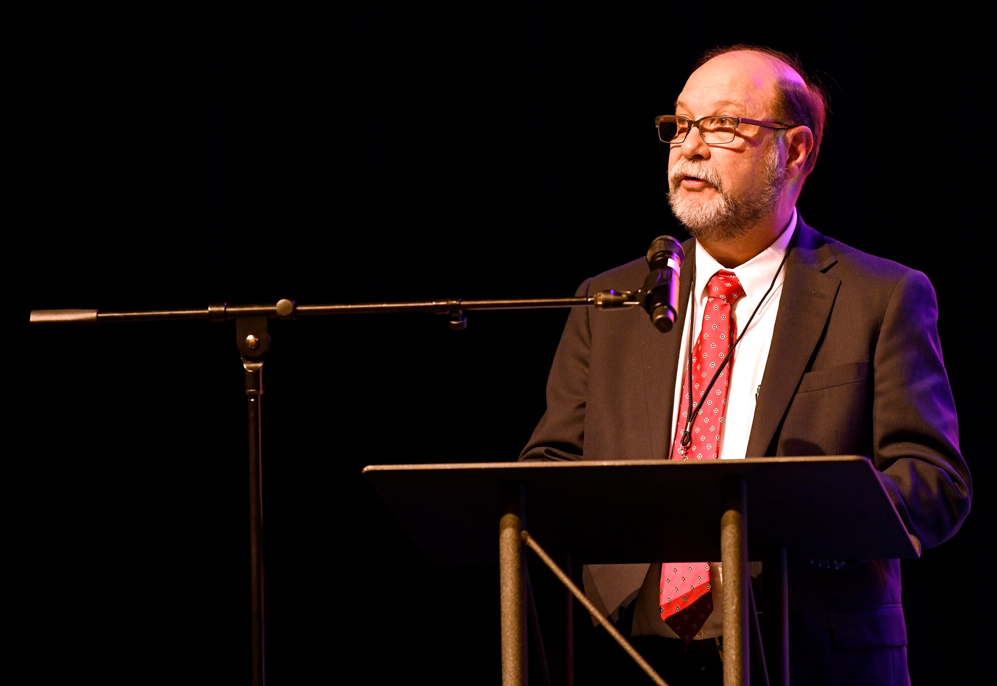 J. Michael Kretzer, 688th Cyberspace Wing technical director, speaks to the audience after being inducted into the CyberTexas Foundation’s 2019 Cyber Hall of Honor in San Antonio, Aug. 20, 2019. Kretzer was honored for his nearly 45 years of cybersecurity service to the nation. (U.S. Air Force photo by Tech. Sgt. R.J. Biermann)