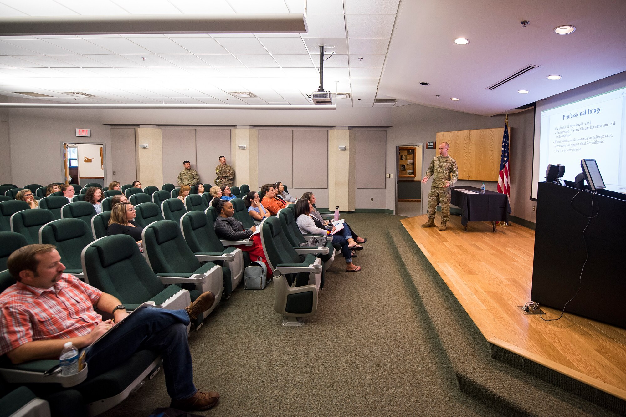 Team Moody spouses, left, receive a briefing during a Heart link spouse orientation Aug. 21, 2019, at Moody Air Force Base, Ga. The orientation is geared toward providing all spouses and family members with the necessary support and information to ensure that they are aware of the resources available to them such as: Tricare, legal assistance, Airman and Family Readiness Center and financial assistance. (U.S. Air Force photo by Airman 1st Class Eugene Oliver)