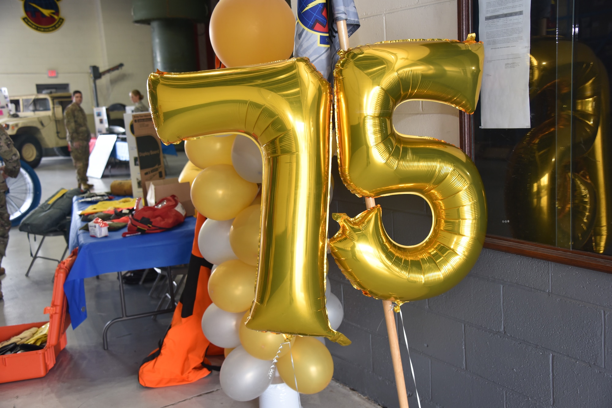 The 305th Operations Support Squadron celebrated the 75th Anniversary of the 305th Operations Support Squadron’s heritage, which was united from two squadrons – the 305th Airdrome Squadron and the 305th OSS with a Silver Carpet Day on August 16, 2019 at Joint Base McGuire-Dix-Lakehurst, N. J. Silver Carpet Day provided an opportunity for friends and family to learn about the history, people and mission of the 305th OSS. (U.S. Air Force photo by Staff Sgt. AJ Hyatt)