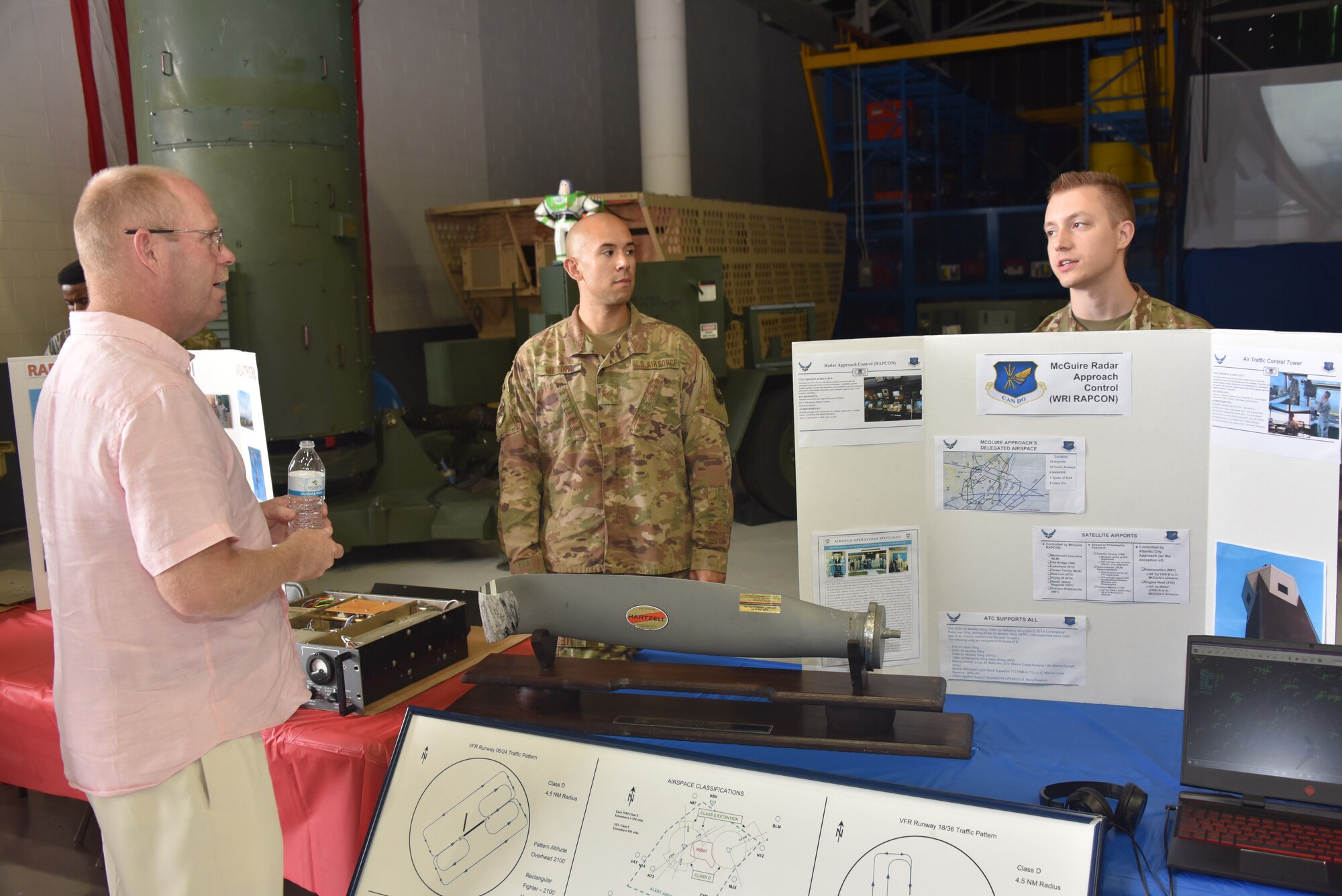 The 305th Operations Support Squadron celebrated the 75th Anniversary of the 305th Operations Support Squadron’s heritage, which was united from two squadrons – the 305th Airdrome Squadron and the 305th OSS with a Silver Carpet Day on August 16, 2019 at Joint Base McGuire-Dix-Lakehurst, N. J. 305th OSS sections such as the Radar Approach Control, Airfield Management, Host Aviation Resource Management (HARM) office, Radar Airfield and Weather Systems (RAWS) Deployable Radar, Airfield and Weapons Systems (dRAWS), Combat Crew Communications, Weather flight and Aircrew Flight Equipment (AFE) created informative posters and answered questions from their respective booths from visitors.  (U.S. Air Force photo by Staff Sgt. AJ Hyatt)