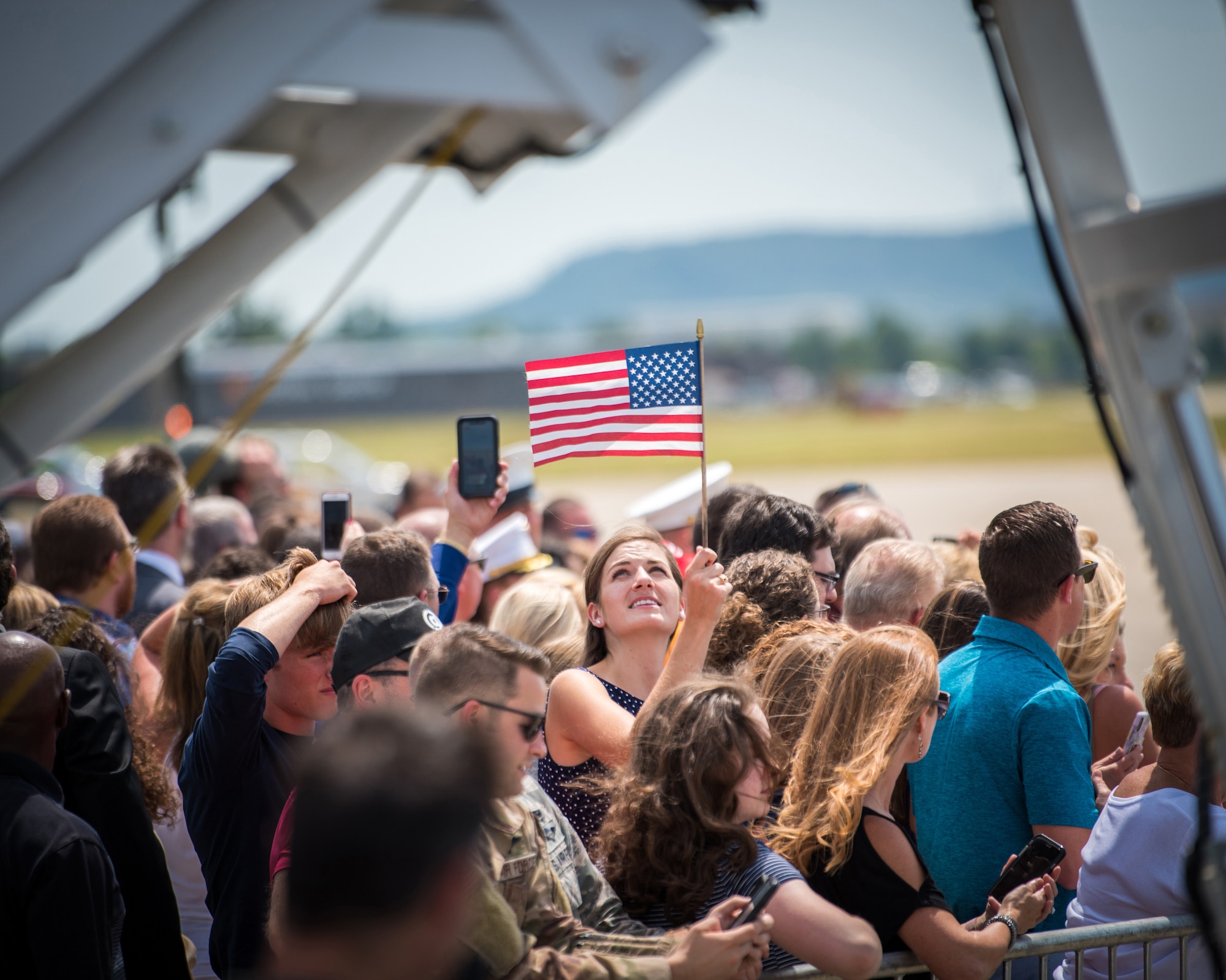 A supporter of President Donald Trump waits for his arrival at the Kentucky Air National Guard Base in Louisville, Ky., Aug. 21, 2019. Trump was in town to speak at an AMVETS convention and attend a fundraiser for Kentucky Gov. Matt Bevin’s re-election campaign. (U.S. Air National Guard photo by Airman 1st Class Chloe Ochs)