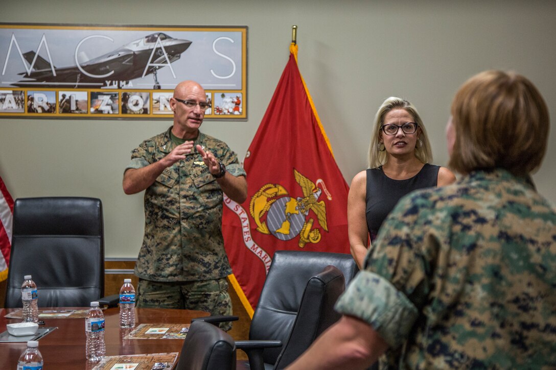 U.S. Senator from Arizona, Kyrsten Sinema, visits Marine Corps Air Station (MCAS) Yuma, Ariz., August 21, 2019. Sen. Sinema met with the MCAS Yuma Commanding Officer, Col. David A. Suggs, and Sergeant Major, Sgt. Maj. David M. Leikwold, and the I Marine Expeditionary Force (MEF) Sgt. Maj., Sgt. Maj. James K. Porterfield. Sen. Sinema toured MCAS Yuma and spoke at a town hall meeting hosted by the air station at the station chapel. The town hall gave service members and civilians who work on the installation an opportunity to discuss topics that are important to them. (U.S. Marine Corps photo by Cpl. Sabrina Candiaflores)