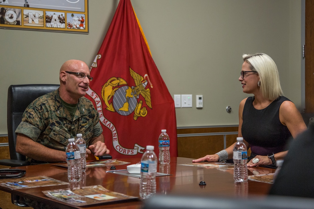 U.S. Senator from Arizona, Kyrsten Sinema, visits Marine Corps Air Station (MCAS) Yuma, Ariz., August 21, 2019. Sen. Sinema met with the MCAS Yuma Commanding Officer, Col. David A. Suggs, and Sergeant Major, Sgt. Maj. David M. Leikwold, and the I Marine Expeditionary Force (MEF) Sgt. Maj., Sgt. Maj. James K. Porterfield. Sen. Sinema toured MCAS Yuma and spoke at a town hall meeting hosted by the air station at the station chapel. The town hall gave service members and civilians who work on the installation an opportunity to discuss topics that are important to them. (U.S. Marine Corps photo by Cpl. Sabrina Candiaflores)