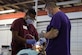 U.S. Navy Reserve Lt. Cdr. Nathan Ocasio, dentist, Expeditionary Medical Facility Dallas One, Ft. Worth, Texas, and U.S. Air Force Staff Sgt. Stephen Clark, dental technician, 88th Medical Group, Wright-Patterson Air Force Base, Ohio, provide dental care during Innovative Readiness Training Appalachian Care 2019 at Wise County Fairgrounds, Wise, Va., Aug. 19, 2019. Appalachian Care Innovative Readiness Training 2019 takes place Aug. 16-29, 2019, to care for the medically underserved communities of Wise, Virginia while simultaneously conducting deployment and readiness training for military personnel. Innovative Readiness Training is the only hands-on training opportunity authorized to operate within the U.S. During Appalachian Care IRT 2019, medical operations will be staged at one physical location at Wise County Fairgrounds. The Appalachian Care IRT 2019 team provides medical, dental, optometry and veterinary care to assist local health and municipal authorities in addressing underserved and unmet community health and civic needs. Units also conduct critical mission training and logistical movement in order to simulate hands-on deployment readiness operations and health care delivery in the time of crisis, conflict or disaster (Air National Guard photo by 1st Lt. Andrew Layton).