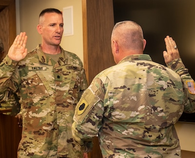 Lt. Col. Loren Easter recites the oath of office following his promotion.