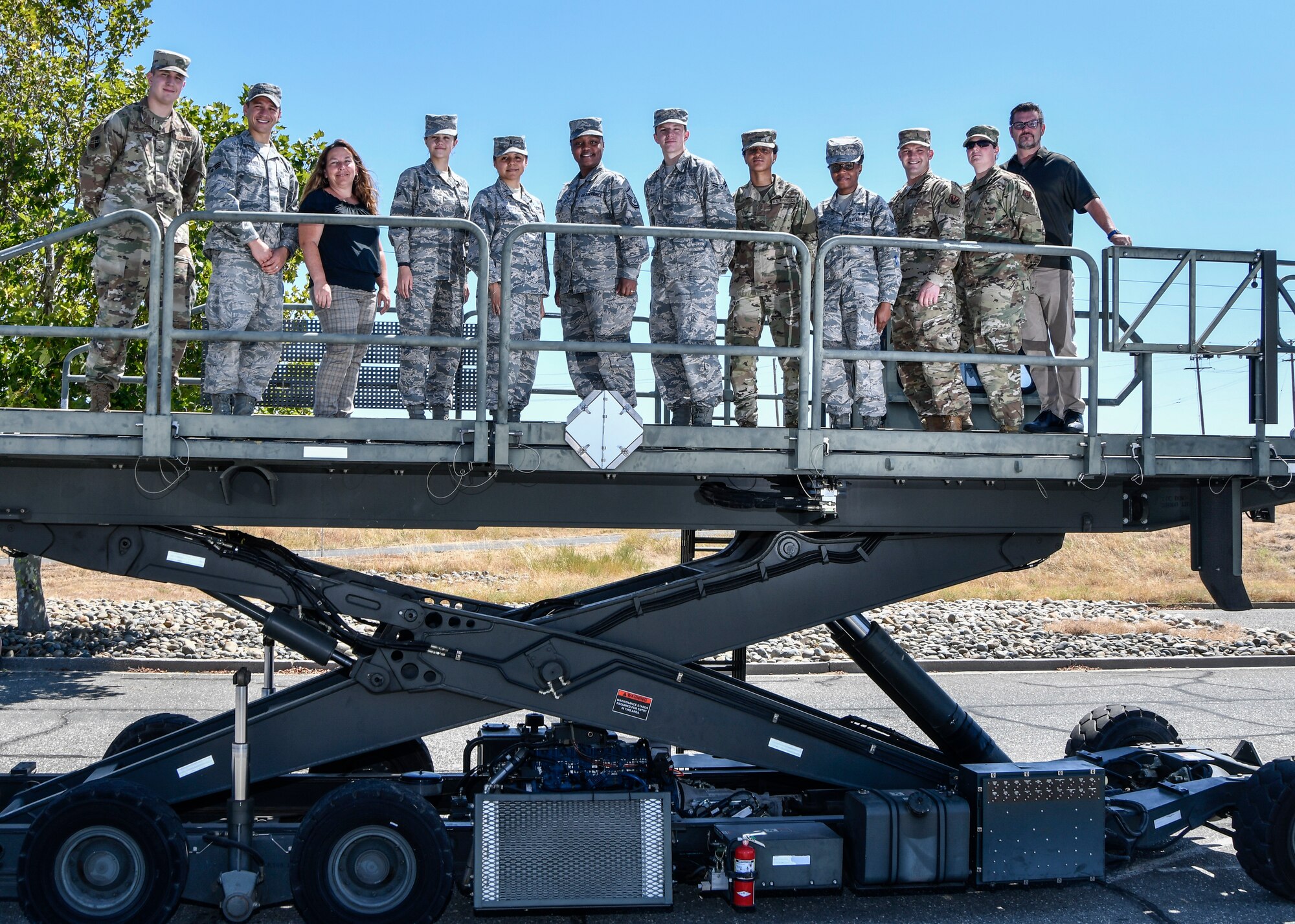 The 9th Logistics Readiness Squadron Individual Deployment Readiness Cell team poses for a group photo at Beale Air Force Base, California, August 1, 2019. (U.S. Air Force photo by Tech. Sgt. Alexandre Montes)