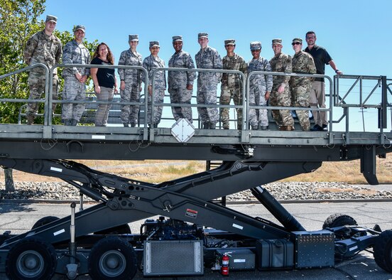 The 9th Logistics Readiness Squadron Individual Deployment Readiness Cell team poses for a group photo at Beale Air Force Base, California, August 1, 2019. (U.S. Air Force photo by Tech. Sgt. Alexandre Montes)