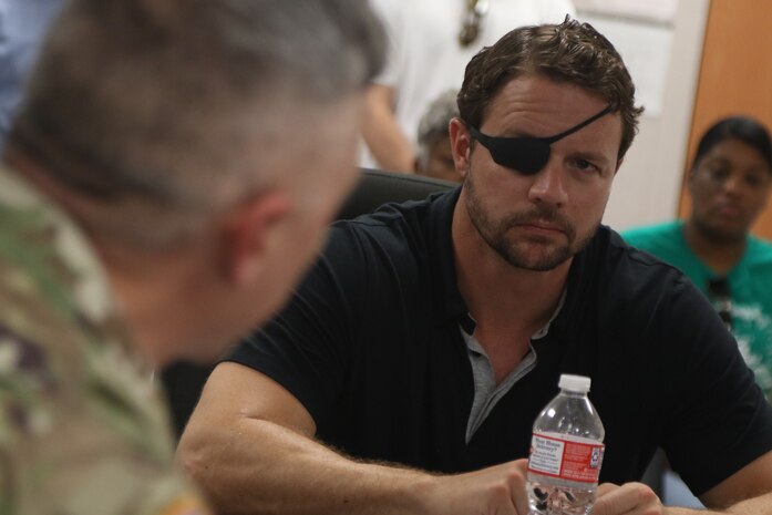 U.S. Representative Dan Crenshaw, representing the 2nd District in the Houston area, visited the  Addicks Resident office and met with Col. Timothy Vail, Galveston District commander and members of the Corps to get updated on the Addicks and Barker project as well as the Buffalo Bayou and Tributaries Resiliency Study.  Congressman Crenshaw also had an aerial tour the Barker Dam and Addicks Reservoir and the San Jacinto River / Lake Houston area.