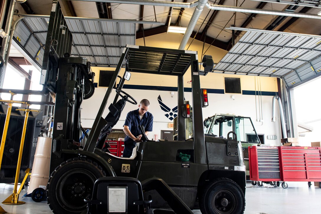 Airman 1st Class Alex Romero, 23d Logistics Readiness Squadron fire truck maintenance apprentice, performs maintenance on a forklift Aug. 22, 2019, at Moody Air Force Base, Ga. Vehicle Maintenance is responsible for servicing more than 400 vehicles on base, which allows Moody operations to maintain their pace. (U.S. Air Force photo by Senior Airman Erick Requadt)
