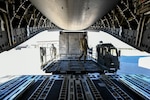 Airmen with the 75th Logistics Readiness Squadron unload cargo from a C-17 Globemaster III at Hill Air Force Base, Utah, Aug. 9, 2019. The C-17 is attached to the Reserve 89th Airlift Squadron assigned to the 445th Aircraft Wing out of Wright-Patterson AFB, Ohio. (U.S. Air Force photo by Cynthia Griggs)