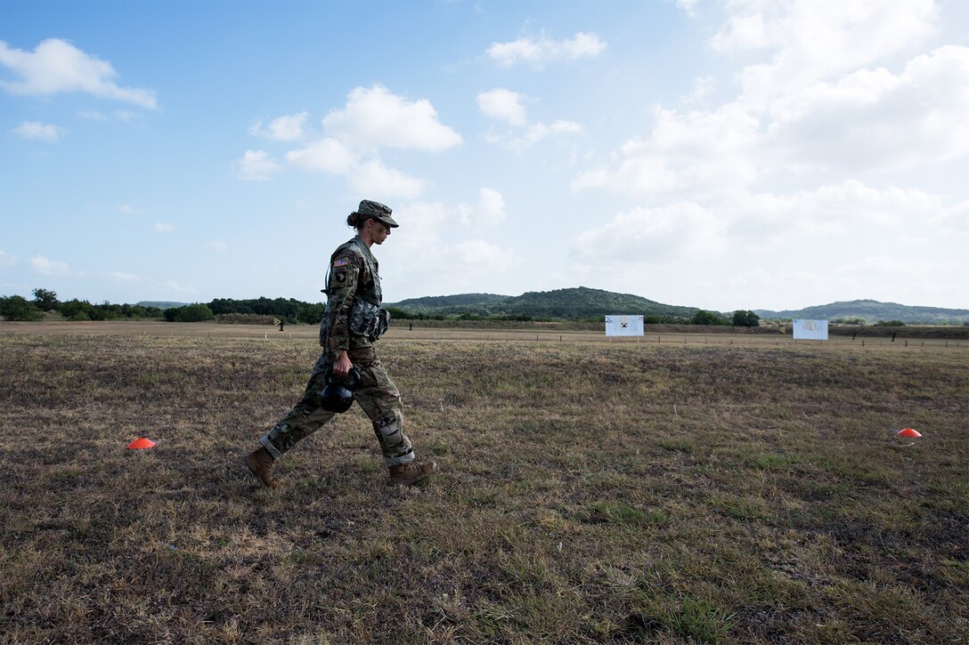 A soldier walks toward a shooting range.