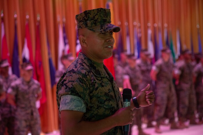 Newly appointed sergeant major of 4th Marine Regiment, Sgt. Maj. Luis M. Leiva, gives remarks, during a relief and appointment ceremony at Camp Schwab, Okinawa, Japan, Aug. 16, 2019. During the ceremony, Leiva transferred leadership to Sgt. Maj. Jose H. Molina, who was selected as the new 4th Marine Regiment sergeant major. (U.S. Marine Corps photo by Lance Cpl. D’Angelo Yanez)