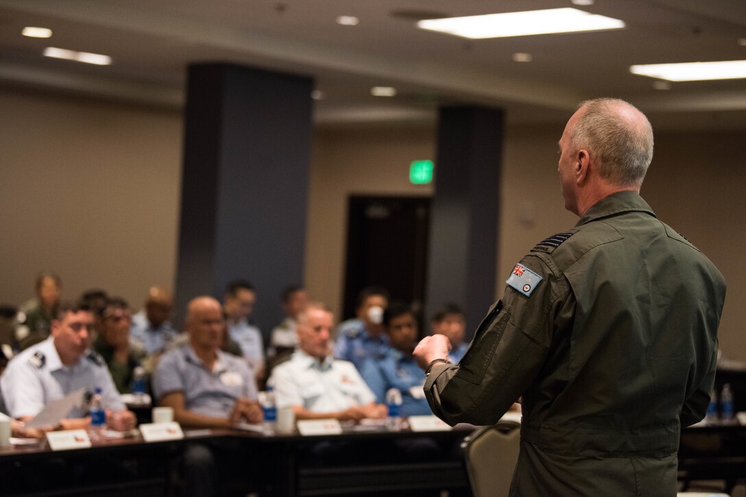 Royal Australian Air Force Group Capt. Nigel Ward, Director of Defence Flights Safety Bureau, gives a presentation during the Indo-Pacific Safety Air Forces Exchange in Waikiki, Hawaii, Aug. 20, 2019.