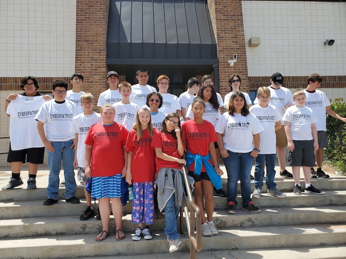 Cyber Patriot Camp participants show off their hard-earned t-shirts. (U.S. Air Force photo by Dwight Harp)