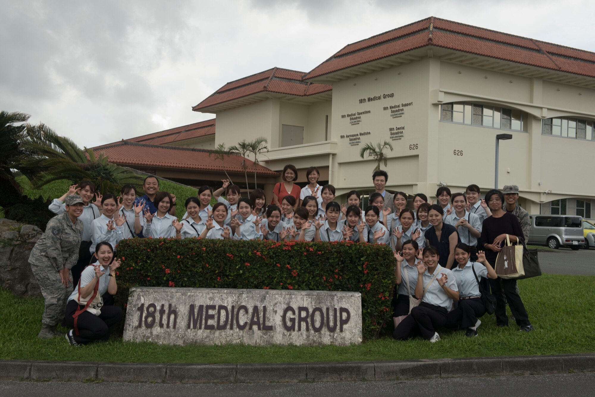 The White Dental Clinic students pose for a group picture in front of the 18th Medical Group building on Aug. 16, 2019.
