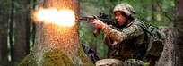 A Ukrainian mechanized infantry soldier fires at Opposing Forces (OPFOR) trying to advance forward, during the culminating force on force exercise of Combined Resolve XII at the Joint Multinational Readiness Center in Hohenfels, Germany Aug. 19, 2019.