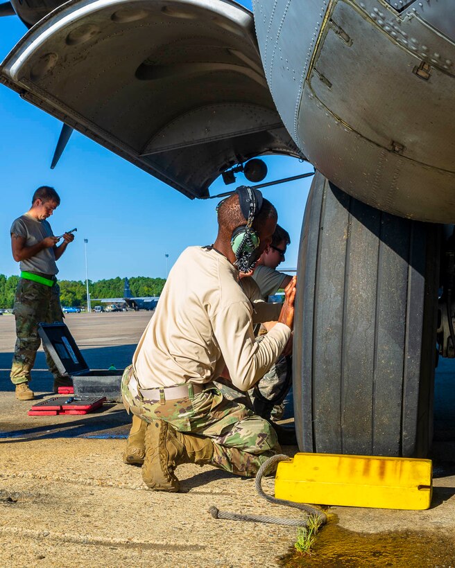 Air Force Reserve Airmen from the 913th Maintenance Squadron work with 19th Airlift Wing active duty members to troubleshoot the landing gear of a C-130J Hercules on August 15, 2019, at Little Rock Air Force Base, Ark.  There are 20 Reserve members who work with Team Little Rock maintenance personnel to ensure combat airlift is available. Mobility aircraft, such as the C-130J, deliver critical personnel and cargo and provide airdrop of time-sensitive supplies, food and ammunition on a global scale. A critical part of the airlift capabilities are the efforts of the maintenance personnel who ensure the workhorse of the mobility force, the C-130, is always ready, always there! (U.S. Air Force Reserve photo by Maj. Ashley Walker)