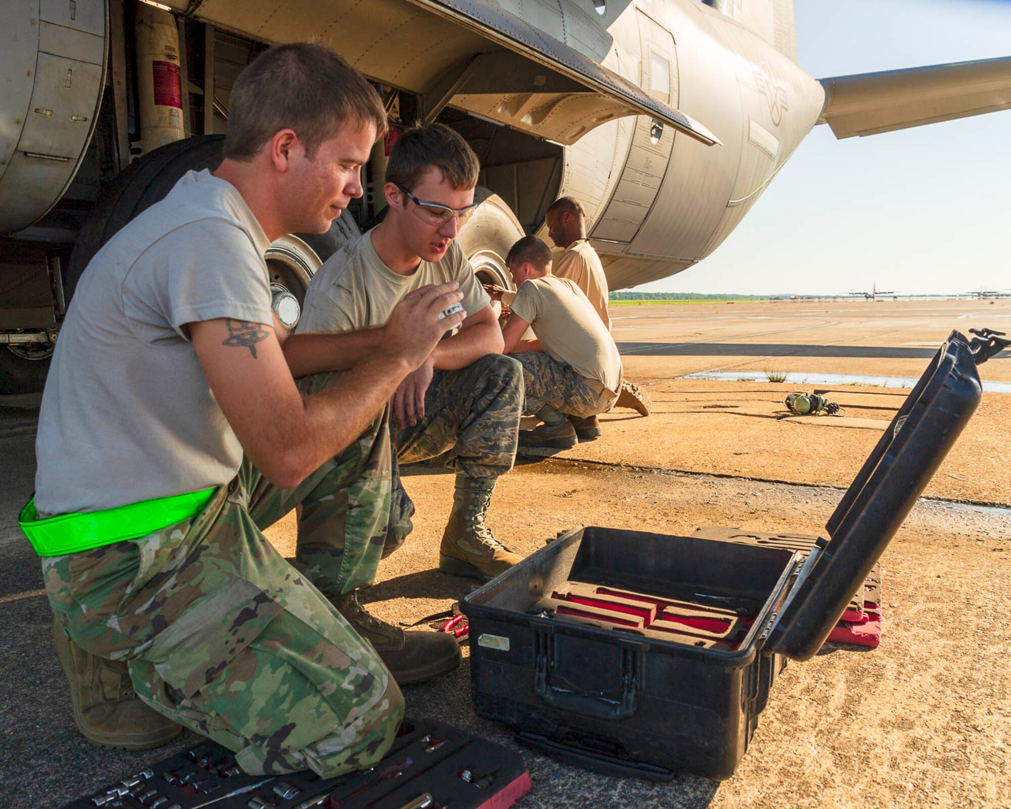 Air Force Reserve Airmen from the 913th Maintenance Squadron work with 19th Airlift Wing active duty members to troubleshoot the landing gear of a C-130J Hercules on August 15, 2019, at Little Rock Air Force Base, Ark.  There are 20 Reserve members who work with Team Little Rock maintenance personnel to ensure combat airlift is available. Mobility aircraft, such as the C-130J, deliver critical personnel and cargo and provide airdrop of time-sensitive supplies, food and ammunition on a global scale. A critical part of the airlift capabilities are the efforts of the maintenance personnel who ensure the workhorse of the mobility force, the C-130, is always ready, always there! (U.S. Air Force Reserve photo by Maj. Ashley Walker)