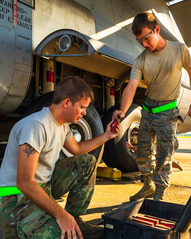 Air Force Reserve Airmen from the 913th Maintenance Squadron work with 19th Airlift Wing active duty members to troubleshoot the landing gear of a C-130J Hercules on August 15, 2019, at Little Rock Air Force Base, Ark.  There are 20 Reserve members who work with Team Little Rock maintenance personnel to ensure combat airlift is available. Mobility aircraft, such as the C-130J, deliver critical personnel and cargo and provide airdrop of time-sensitive supplies, food and ammunition on a global scale. A critical part of the airlift capabilities are the efforts of the maintenance personnel who ensure the workhorse of the mobility force, the C-130, is always ready, always there! (U.S. Air Force Reserve photo by Maj. Ashley Walker)