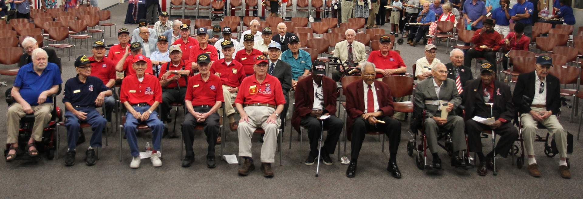 World War II veterans gather for a group photo after a ceremony honoring their service and sacrifice at the Military and Family Readiness Center at Joint Base San Antonio-Fort Sam Houston Aug. 20. The ceremony was hosted by the FSH Survivor Outreach Services Support Program in partnership with the FSH Gold Star Families as a way to honor the WWII veterans who were unable to travel to France for the 75th Anniversary of D-Day.