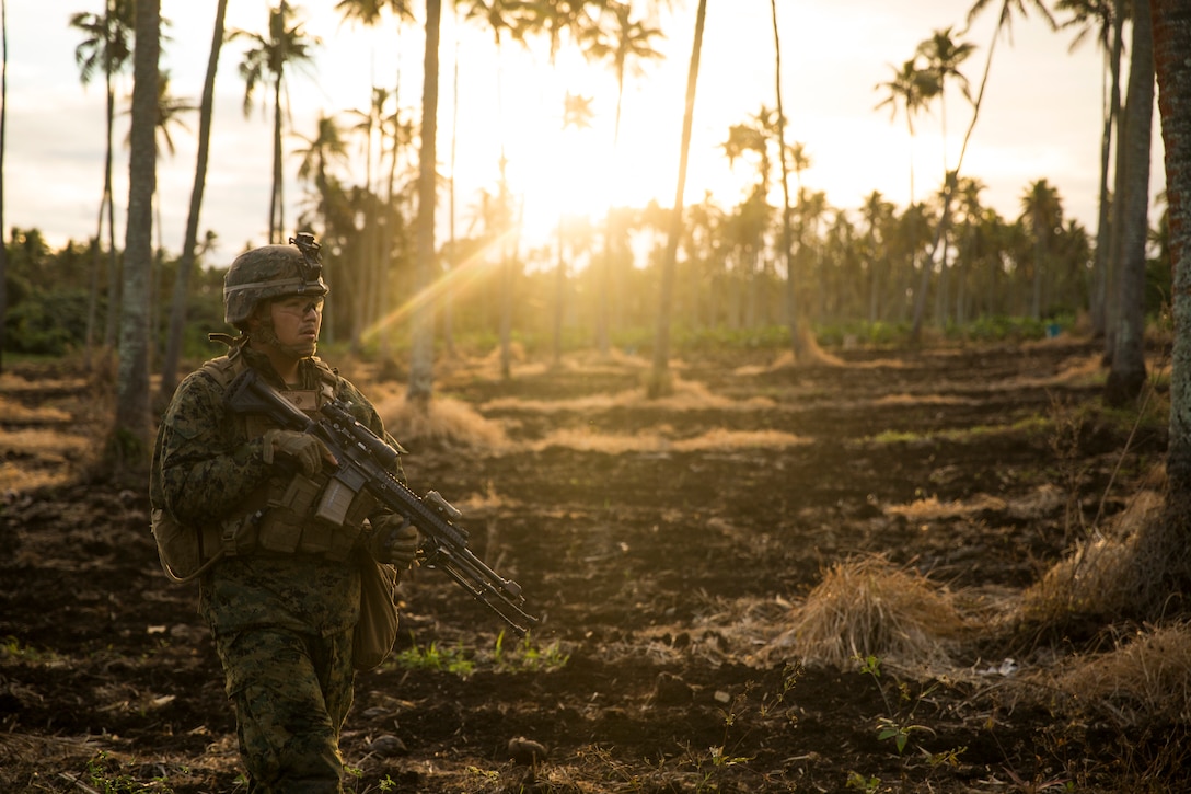 U.S. Marine Corps Lance Cpl. Phillip Pike, a rifleman with the Ground Combat Element, Marine Rotational Force – Darwin, patrols through a training area as part of Exercise Tafakula, Pea, Tonga, August 19, 2019. Tafakula is a multilateral exercise hosted by His Majesty’s Armed Forces of Tonga, which includes MRF-D Marines and service members from the New Caledonian Armed Forces, the New Zealand Defence Force, the Australian Defence Force and the Nevada National Guard. The exercise provides an exceptional opportunity to develop relationships, learn about each other's cultures, and share military capabilities.