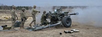Czech Staff Sgt. Radim Hava direct fires a M119 105 mm howitzer with U. S. paratroopers assigned to A Battery, 4th Battalion, 319th Airborne Field Artillery Regiment, 173rd Airborne Brigade at the culmination of exercise Dynamic Front 19 at Torun, Poland, March 8, 2019.