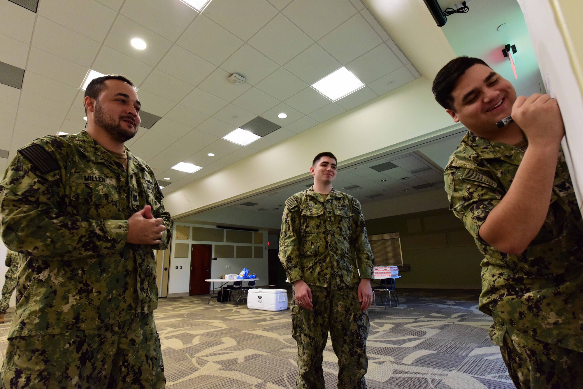 Sailors from Joint Base McGuire-Dix-Lakehurst, New Jersey work on group exercise during the Garden State Petty Officer Second Class Symposium at Naval Air Engineering Station Lakehurst Flight Deck on Aug. 15, 2019. The symposium is designed to build leadership foundations for E-4’s and E-5’s in the U.S. Navy. (U.S. Air Force photo by Airman 1st Class Shay Stuart)