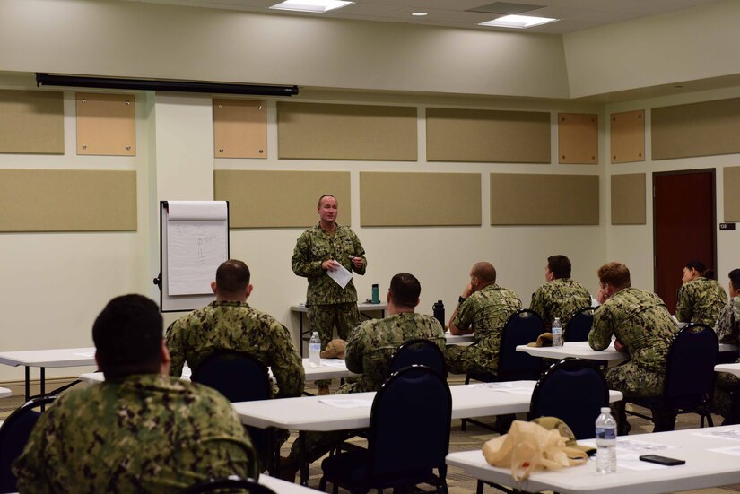 Sailors from Joint Base McGuire-Dix-Lakehurst, New Jersey attend discussions for the Garden State Petty Officer Second Class Symposium at Naval Air Engineering Station Lakehurst Flight Deck on Aug. 15, 2019. The symposium is designed to build leadership foundations for E-4’s and E-5’s in the U.S. Navy. (U.S. Air Force photo by Airman 1st Class Shay Stuart)