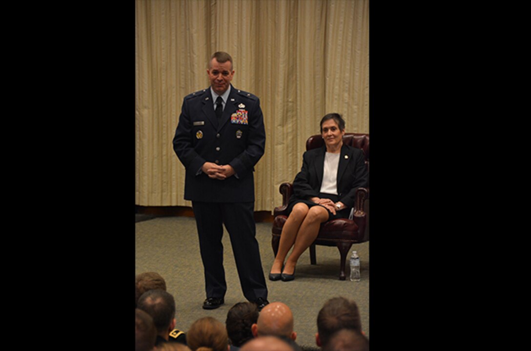 General speaks with graduates