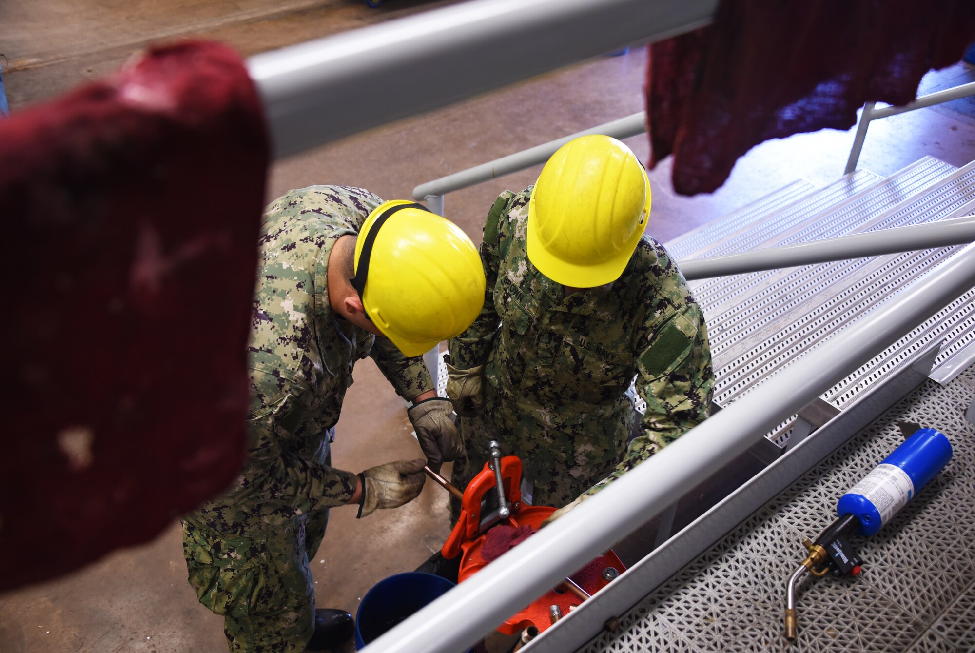 Water and fuels systems maintenance course students, install copper tubing for a hot water distribution system at Sheppard Air Force Base