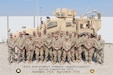 Members of the 1st Theater Sustainment Command's Syrian Logistics Cell stand for a group photo in Erbil, Iraq.