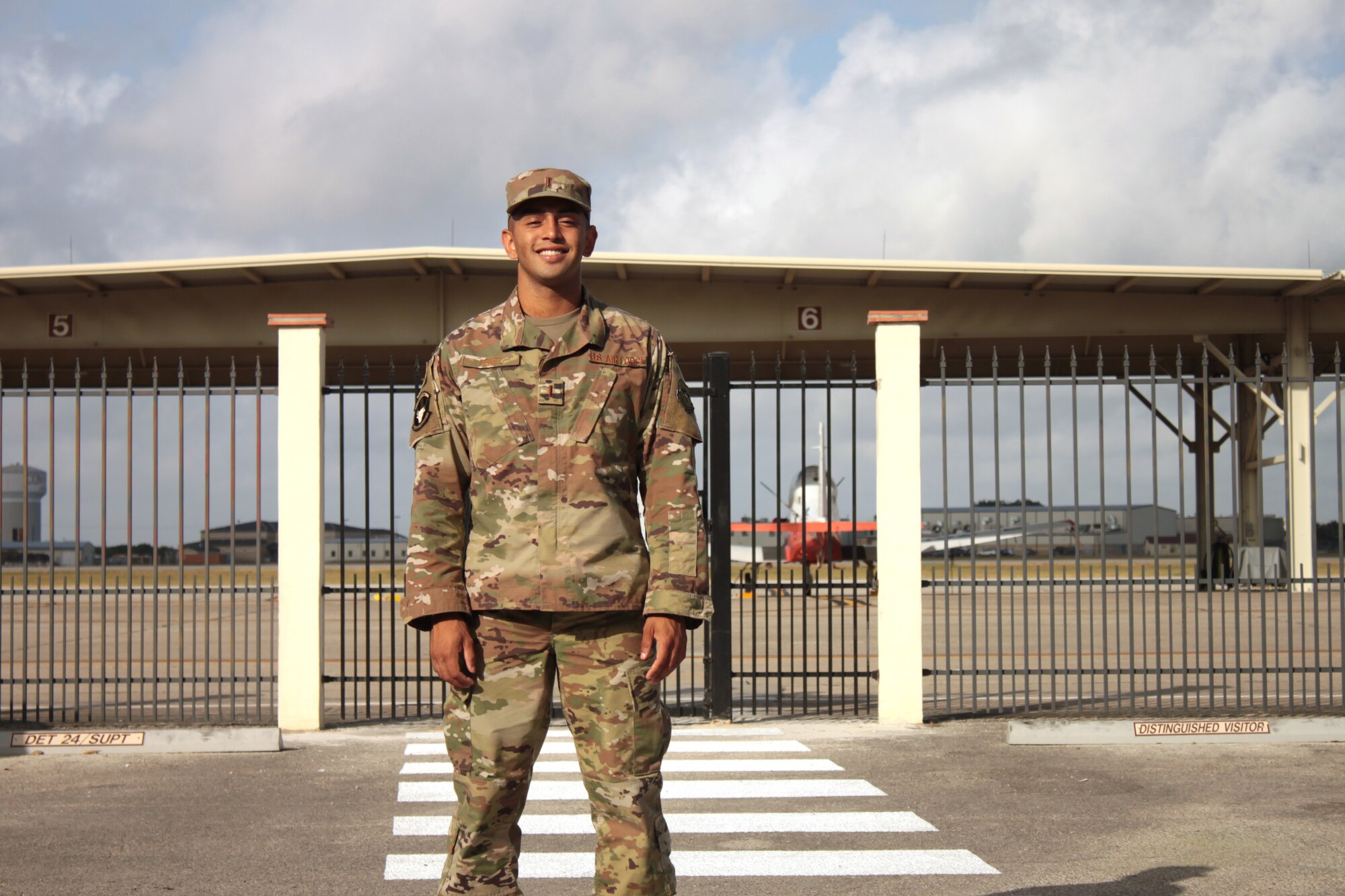 U.S. Air Force 2nd Lt. Isaac Perez stands outside the flight line at Joint Base San Antonio-Randolph 24 Aug. 20, 2019. Perez, who is awaiting the start of version three of “Pilot Training Next,” was the 2019 winner of the Intercollegiate Tennis Association’s national Arthur Ashe Jr. Leadership and Sportsmanship award. (U.S. Air Force photo by 2nd Lt. Robert Guest)