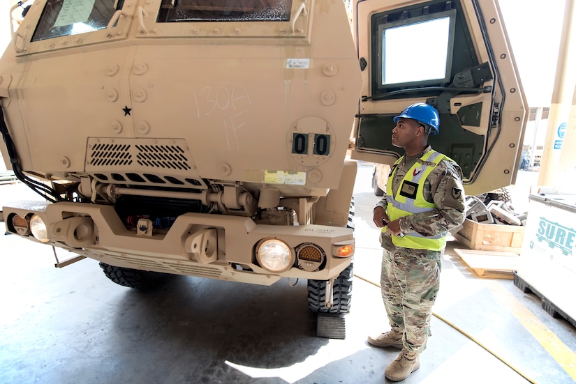 Sgt. 1st Class Roy Carson, maintenance quality assurance for wheeled vehicles, 401st Army Field Support Battalion-Kuwait, starts an inspection of a military supply truck Aug. 10 at Army Prepositioned Stocks-5, Camp Arifjan, Kuwait.