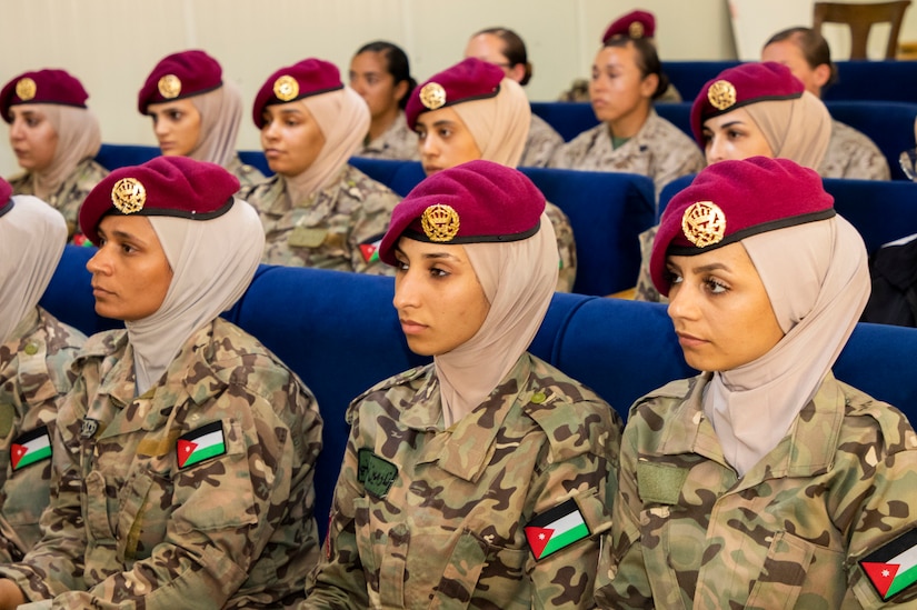 Jordan Armed Forces-Arab Army Quick Reaction Force Female Engagement Team (FET) members listen closely during the closing ceremony of the subject matter exchange with the 11th Marine Expeditionary Unit (FET) August 7, 2019 in Jordan. The U.S. is committed to the security of Jordan and to partnering closely with JAF to meet common security challenges.