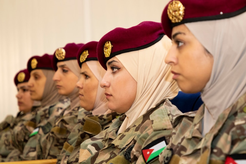 Jordan Armed Forces-Arab Army Quick Reaction Force Female Engagement Team (FET) members listen closely during the closing ceremony of the subject matter exchange with the 11th Marine Expeditionary Unit (FET) August 7, 2019 in Jordan. The U.S. is committed to the security of Jordan and to partnering closely with JAF to meet common security challenges.