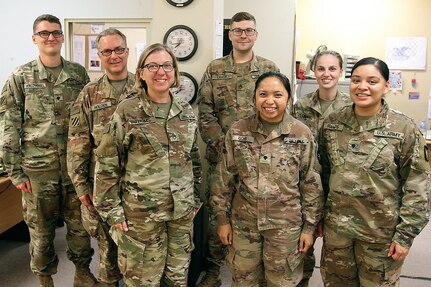 Soldiers of the 247th Finance Management Support Detachment gather at Camp Arifjan, Kuwait, Aug. 19, 2019.