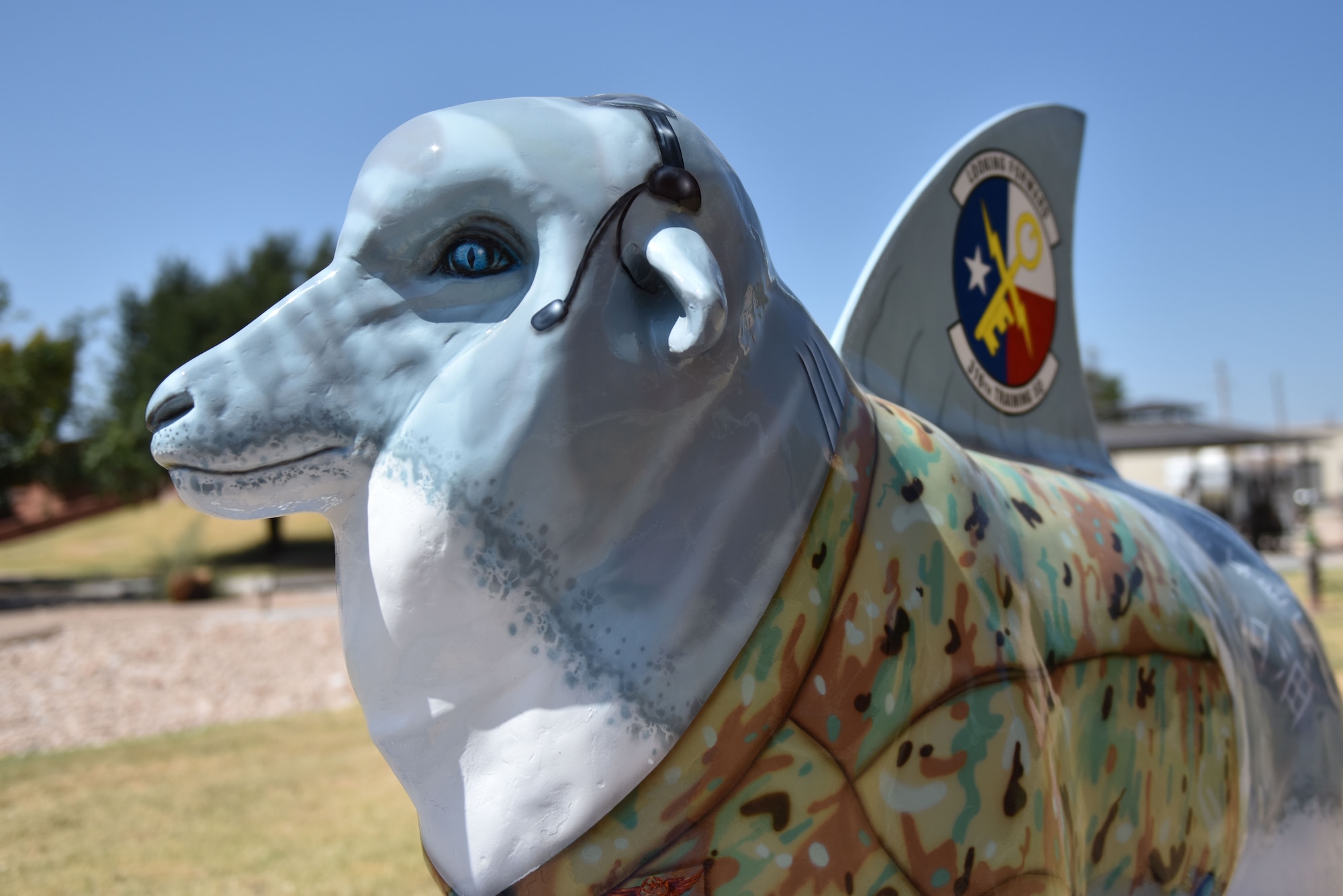 Meg, short for Megaladon, is a fiberglass sheep painted in honor of the 316th Training Squadron’s mascot and is displayed outside of the Fred Sebers Hall on Goodfellow Air Force Base, Texas. The vision of the 316th TRS is to develop leaders and deliver relevant and realistic joint intelligence, surveillance, and reconnaissance training for the Department of Defense. (U.S. Air Force photo by Senior Airman Seraiah Wolf/Released)