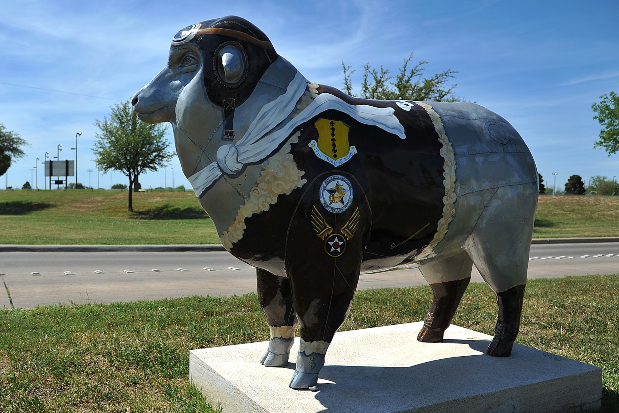 Lt. Col. Ewe Little, a fiberglass sheep on display outside of Goodfellow Air Force Base, painted in honor of the previous mission of the base which included pilot training. Ewe Little is one of the first things that visitors will see when entering the Visitor Center of the base. (Courtesy photo)