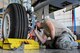 U.S. Air Force Airman 1st Class Joseph Larson, 355th Equipment Maintenance Squadron crew chief, inspects the wheel well of an A-10 Thunderbolt II at Davis-Monthan Air Force Base, Arizona, Aug. 8, 2019. Airmen assigned to the 355th EMS A-10 Phase section are tasked to perform detailed inspections to ensure A-10 Thunderbolt IIs uphold war-ready status. (U.S. Air Force photo by Airman 1st Class Kristine Legate)